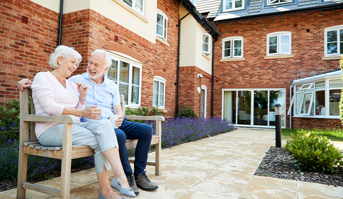 Senior couple enjoying an outdoor living area