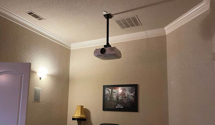 Ceiling-mounted projector in media room