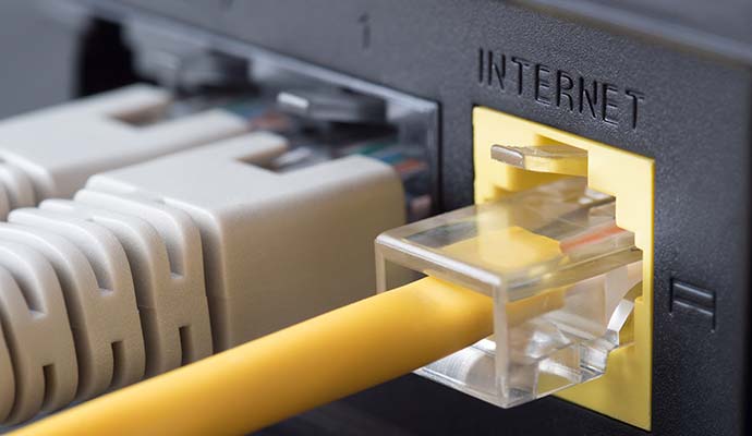 Ethernet cable plugged into a router internet port