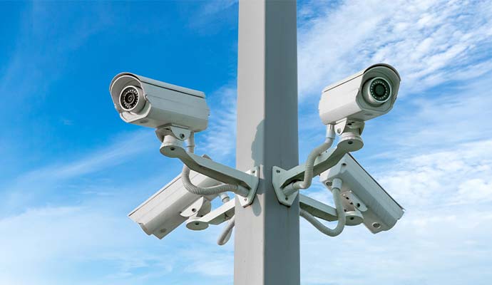 Wireless outdoor surveillance cameras for commercial property security